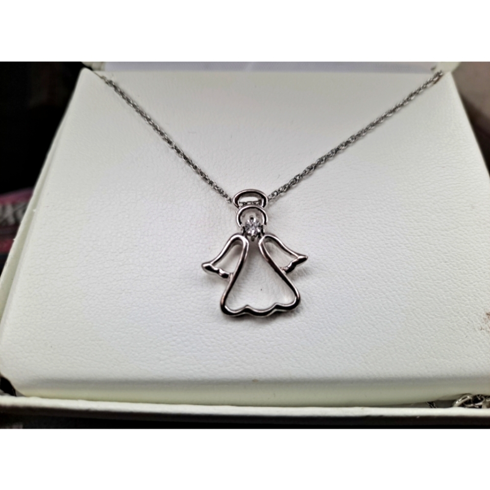 Sterling silver angel necklace with 1/10 diamond